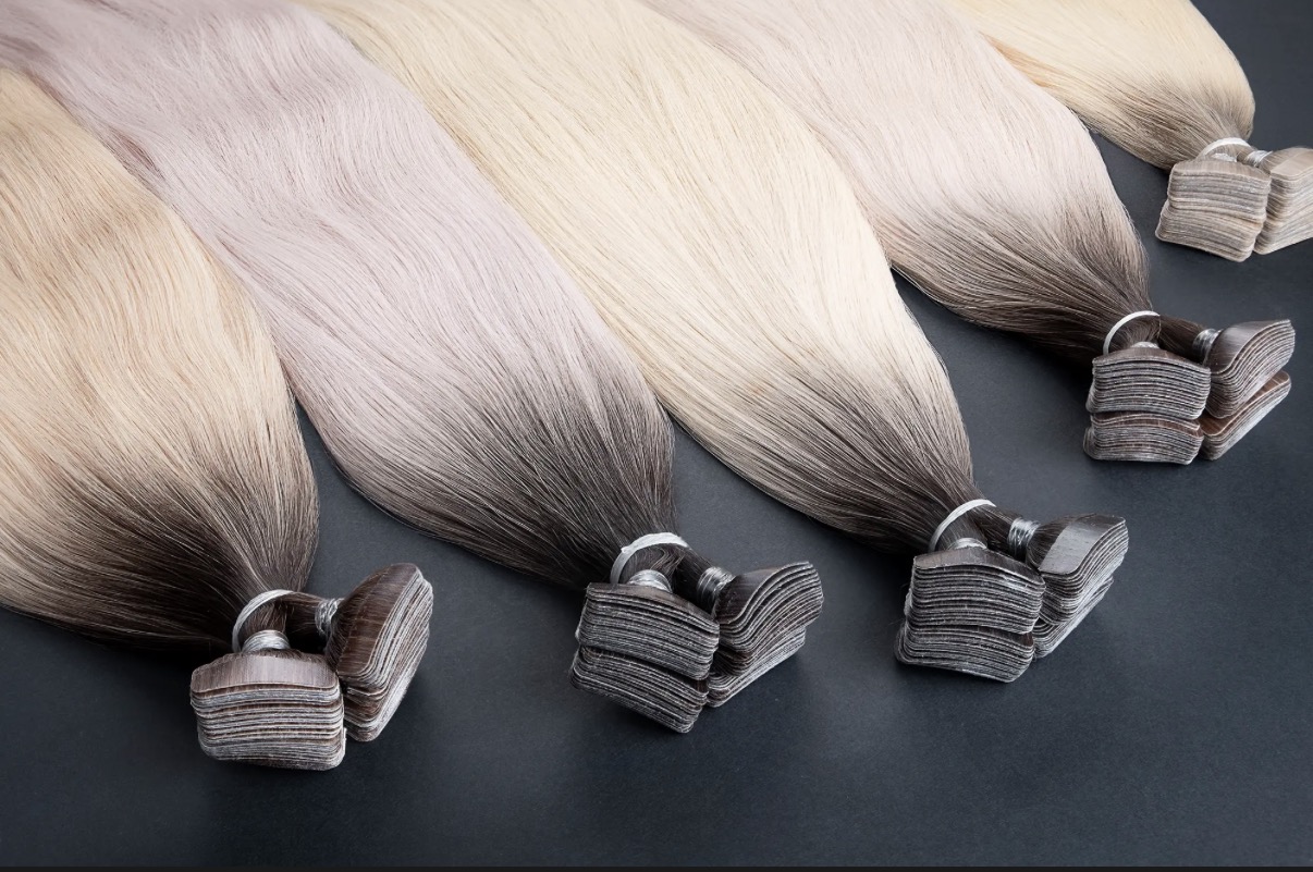 Hair extension colour swatches showing blonde shades on bundles