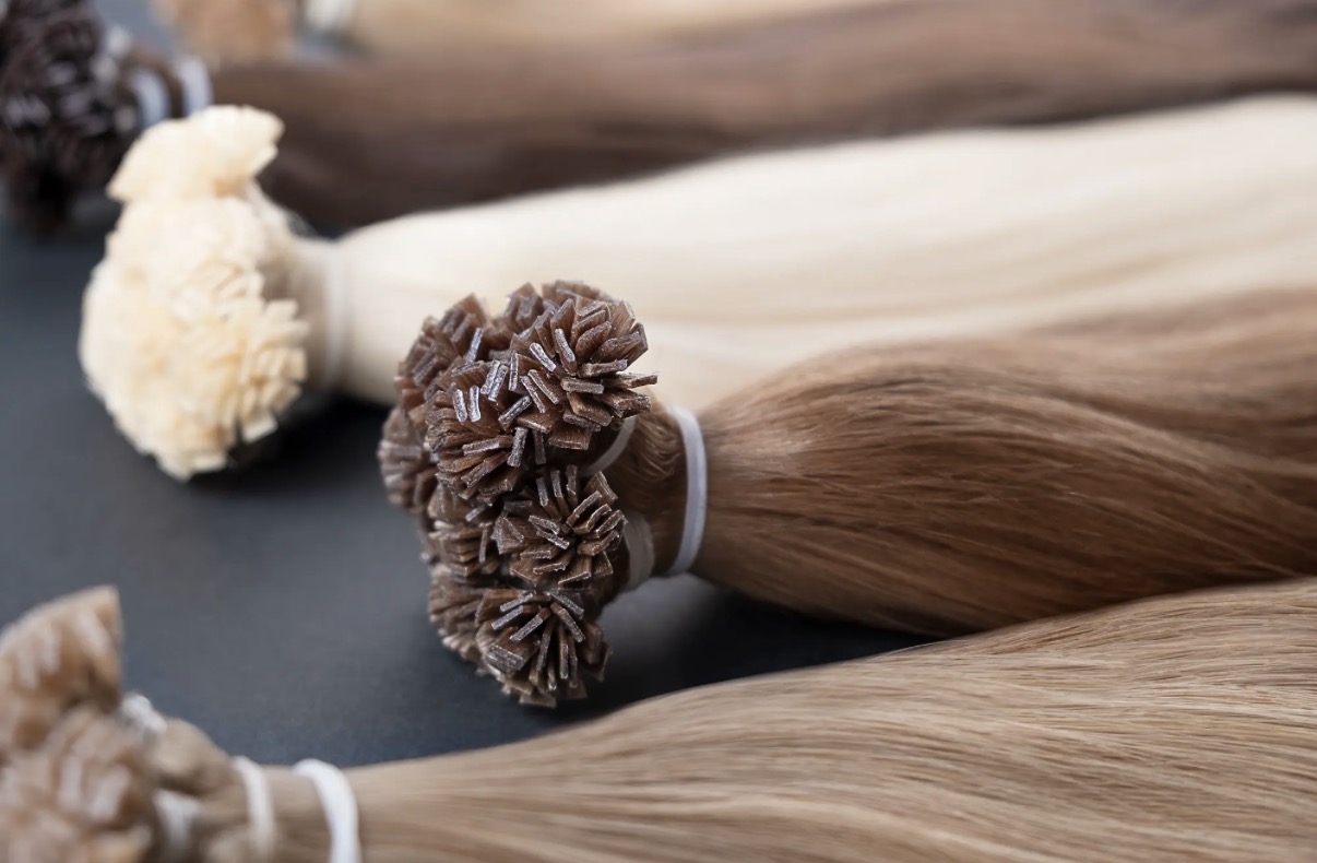 Hair extension application tools with blonde hair colour samples
